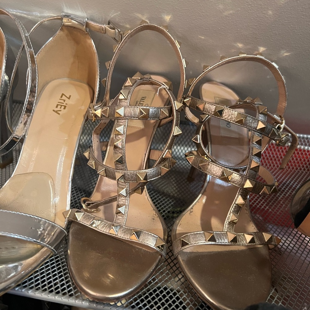 VALENTINO GARAVANI
Gold Rockstud Cage Heeled Sandals